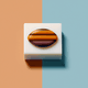 A AI-generated app icon of a bar of soap in khaki , chestnut , blue , dark orange color scheme