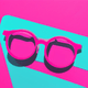 A AI-generated app icon of a glasses in deep pink , hot pink , pink color scheme