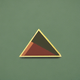 An app icon of a triangle shape with burnt sienna and pale green color scheme