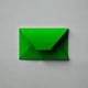 An app icon of a postcard with light pink and green color scheme