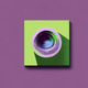 An app icon of a sphere shape with pastel green and lavender color scheme