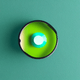 A AI-generated app icon of a magnifier in light sea green , sea green , cornsilk , green color scheme